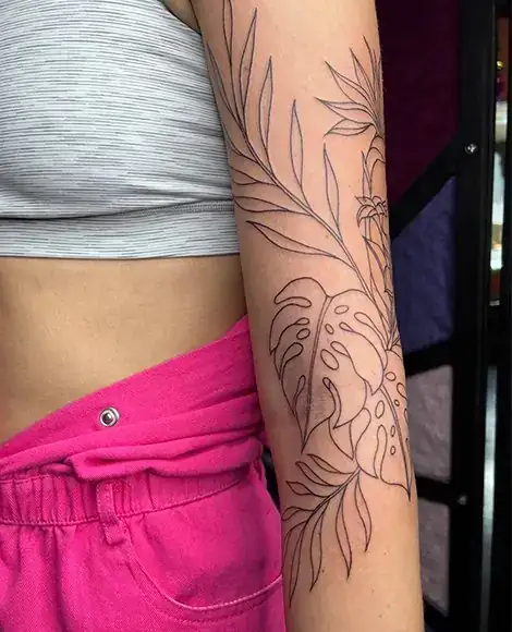 Fine line botanical sleeve tattoo Lusiana Morales Savannah GA