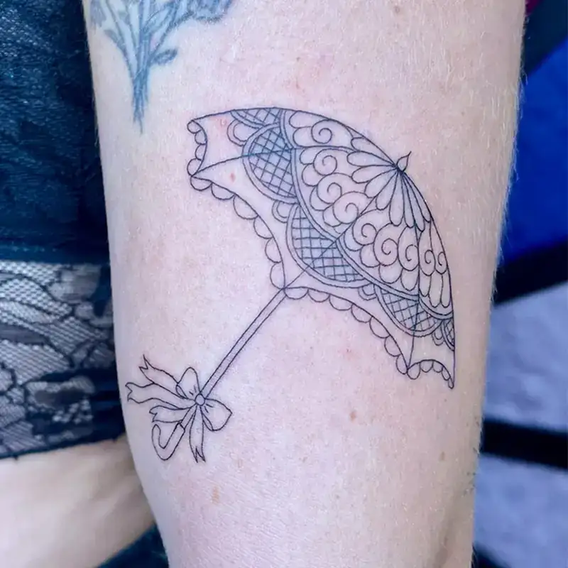 Fine line lace umbrella tattoo illustrative Savannah