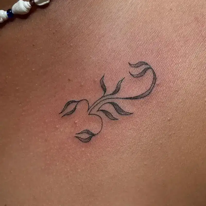 Fine line vine botanical tattoo Savannah GA