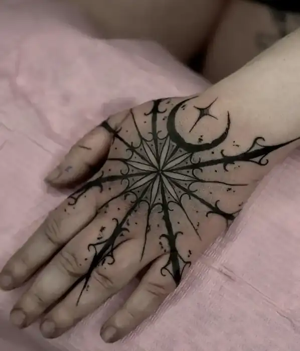 Dark geometric hand tattoo by Savannah Artz Savannah GA
