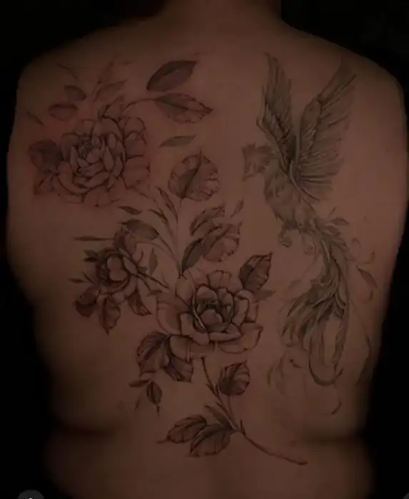 Ornamental sword back tattoo by Savannah Artz Savannah GA
